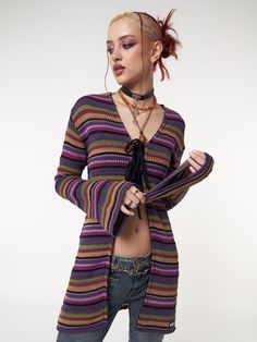 Fact: a girl can never have enough cardigans! Striped tie front knit cardigan. Shades of purple and green stripes. Flared long sleeves, mid-length Regular fit. 100% cotton. Discover women's jumpers, cardigans & other vintage inspired, grunge, fairycore and retro fashion knit styles at Minga London. Striped Long-sleeved Cardigan For Spring, Striped Cotton Cardigan With Long Sleeves, Striped Long Sleeve Cotton Cardigan, Striped Cotton Long Sleeve Cardigan, Trendy Purple Cotton Cardigan, Green And Purple Outfit, Crochet A Crop Top, Minga London, Grunge Fairycore