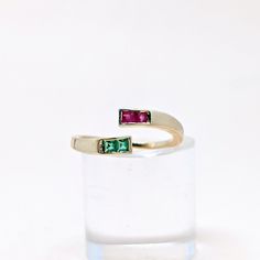 Natural Fine Ruby Emerald Baguette Stone Open Cuff Ring. Precious Gemstone Ring in 14k SOLID GOLD For Her from our Capsule Jewelry Collection. Ruby Emerald Gemstones are set in  Chenal Setting in our Factory. Gold Ring AA+ Quality. Perfect Gift For Everyday or December Birthstone Ring Gift for Your Loved Ones. ►  DIMENSIONS : ◆ Gemstone : Ruby, Emerald 0 30 Cts               ◆ Stone size : 2*2 mm (4Pcs )                                ◆ Shank Width : 1 mm      ◆  Material :  14k Yellow Gold Modern Multi-stone Baguette Cut Rings, 14k Gold Multi-stone Emerald Cut Rings, Multi-stone Baguette Cut Fine Jewelry Rings, Multi-stone Baguette Cut Promise Ring, 14k Gold Multi-stone Baguette Cut Ring, Baguette Cut Multi-stone Promise Rings, 14k Gold Open Ruby Ring, Fine Jewelry Stackable Multi-stone Open Rings, 14k Gold Fusion Ring For Anniversary