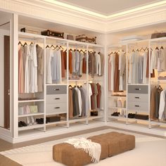 an organized closet with clothes and foot stool