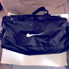 This Is A Brand New Nike Duffel Bag Nike Gym Bag With Zipper Closure, Nike Sporty Bags With Zipper Closure, Nike Black Bag With Zipper Closure, Sporty Nike Bags With Zipper Closure, Black Sports Duffle Bag Tote, Black Sports Duffle Tote Bag, Nike Black Sporty Bag, Nike Sporty Black Gym Bag, Nike Travel Bag With Zipper Closure