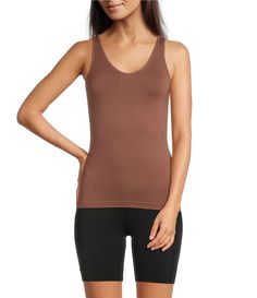 From Modern Movement, this tank features:Solid, soft micro fabricationV-neckline & scoop neckline sleevelessTank strapsReversible neckline Straight hemlinePullover constructionNylon/spandexMachine wash/tumble dry Imported. Stretch Seamless V-neck Vest, Seamless Stretch V-neck Tank Top, Stretch Seamless V-neck Tank Top, Seamless V-neck Stretch Camisole, Stretch Seamless V-neck Camisole, Stretch V-neck Seamless Camisole, Stretch V-neck Tank Top With Seamless Construction, Seamless Elastane V-neck Tank Top, Seamless Stretch Cami Vest