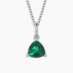 Made in 925 Sterling Silver Necklace Type: Pendant Necklace Pendant Height: 1.2 cm pendant Width: 0.65 cm Pendant Shape: Trillion Cut Gemstone: Trillion cut Created Emerald Gemstone Size: 6.5 mm x 6.5 mm Birthstone:  May Chain Type: Box Chain Chain Length: 45 cm Chain Thickness: 1.0 mm Clasp: Spring Ring Material: Rhodium Plated Sterling Silver Weight: 1.89 gm Circle Earrings Studs, Emerald Pendant, Circle Studs, Emerald Jewelry, Green Necklace, Emerald Gemstone, Gorgeous Earrings, Box Chain, Sterling Silver Necklaces