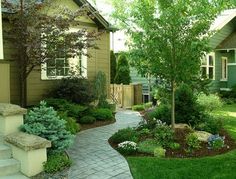 a house with landscaping in the front yard