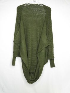 NWOT UNBRANDED ONLINE ITEM GREEN DOLMAN SLEEVE OPEN FRONT CARDIGAN ONE SZ #H980 Shipping: Calculated Important Details Pictures are taken in the best light possible. Please note that we do our best to represent the colors as they appear in person but different lights cause colors to look differently. Also every computer, tablet, and smartphone has different settings that can change the color on your screen. If you are very particular about the color ebay not be for you. Many things are considere Trendy Solid Color Open Knit Sweater, Trendy Open Knit Sweater, Oversized Open Front Winter Tops, Fall Green Stretch Cardigan, Green Non-stretch Tops For Winter, Trendy Stretch Solid Color Cardigan, Stretch Cotton Cardigan For Fall, Trendy One Size Cardigan, Oversized Acrylic Cardigan