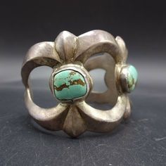 "VINTAGE NAVAJO BRACELET DESCRIPTION: Heavy gauge cast sterling silver, along with a trio of gorgeous light blue turquoise cabs, this bracelet will be a cherished addition to your collection of fine vintage Native American jewelry. MEASUREMENTS: Interior of the cuff measures 5 3/8\" with an additional 1 1/4\" non-adjustable gap. Total circumference: 6 5/8\" Measures 2 1/4\" straight across the widest part (from wrist bone to wrist bone) Bracelet face measures 1 3/4\" wide (the face of the bracel Bone Bracelet, Jewelry Measurements, Bones Bracelet, Vintage Native American Jewelry, Navajo Bracelet, Turquoise Bracelet Cuff, Turquoise Cuff, Vintage Navajo, Coral Turquoise