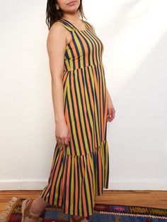 Our soft and stretchy organic cotton jersey is the perfect fabric for this midi dress. With bold stripes, a chic tiered hem, and feel-good wide straps, it's a dress that can go all day and carry you right into the evening. 95% Organic Cotton 5% Spandex Length of size M is 42" from top of bodice Made fair trade in India by one of our longstanding production partners Opal Dress, Bold Stripes, Wide Straps, Fair Trade, Bodice, Opal, Organic Cotton, Midi Dress, Stripes