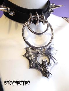 "High quality leather Choker, Stainless Pagan cross , steel spikes. Adjustable strap to fit neck size. Ideal accessory for all Goth, Metal, Darkwave, EBM, Cyberpunk and punk afficionados! Total length 17.3\" Adjustable from 12 to 16\"" Edgy Metal Choker For Cosplay, Adjustable Gothic Choker For Cosplay, Gothic Spiked Choker For Festivals, Gothic Spiked Jewelry For Halloween, Gothic Halloween Jewelry With Spikes, Adjustable Metal Choker For Cosplay, Gothic Choker For Concert, Edgy Silver Choker For Cosplay, Gothic Metal Choker For Concerts