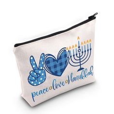 a white zipper bag with peace love and hanukkah on it