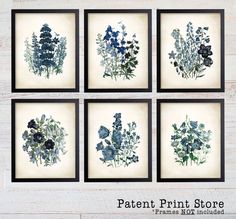 four blue and white floral prints in black frames on a wooden background with text that reads,