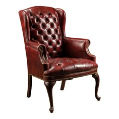 an old fashioned red leather chair with nail polishing on the armrests and back