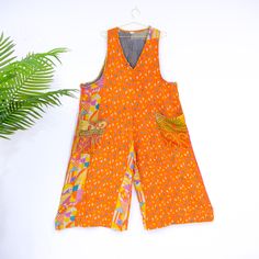 Kantha Loose Fit Jumpsuit, Patchwork Overalls, Bohemian Maxi Dungarees,Boho Chic Style,Plus Size Cotton Jumpsuit, Upcycled Festival Rompers  This stylish and comfortable jumpsuit is the perfect addition to your wardrobe. Made with upcycled cotton, kantha stitching, and a loose fit, it offers a unique bohemian style with added benefits like wide legs, pockets, and plus size options. Its handmade craftsmanship ensures a one-of-a-kind look, perfect for festivals and other occasions. Handmade Material: Cotton Size: One Size (PLUS) Length: Approx. 55 inches Bust: Approx. up to 50 inches Hips: Approx. up to 68 inches Inseam: Approx. up to 20 inches EACH PANT WILL BE DIFFERENT IN COLOR THAN IN THE PICTURE AS THEY ARE MADE OF DIFFERENT PATCHES ** ETHICALLY SOURCED ** FAIRTRADE ** SUSTAINABLE FASHI Chic Style Plus Size, Patchwork Overalls, Festival Romper, Loose Fit Jumpsuit, Boho Chic Style, Bohemian Maxi, Cotton Jumpsuit, Wide Legs, Boho Chic Fashion