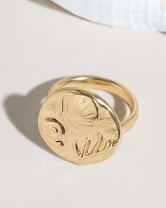 Gold-tone Brass Rings For Gifts, Gold Nickel-free Open Ring, Gold-tone Rings With Polished Finish, Gold Brass Rings With Round Band, Gold Brass Engraved Ring For Promise, Gold Engraved Ring Tarnish Resistant, Gold-tone Gold-plated Jewelry With Ring Detail, Gold Open Dome Ring In Recycled Gold, Adjustable Gold Initial Ring In 14k