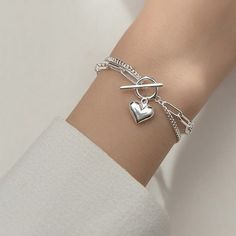 Double Layer Chain Heart Love Bracelet Say "I love you" in style with our Double Layer Chain Heart Love Bracelet! This one-of-a-kind piece is crafted from 92.5% pure silver and 7.5% high-quality and hypoallergenic metals, making it the perfect accessory for even the most sensitive skin. With its double-layer design and heart-shaped charms, this bracelet is both unique and affordable. Whether you're exploring the outdoors or hitting the town, this bracelet is sure to be your new go-to accessory f Halo Wedding Set, Layer Chain, Chain Heart, Cvd Diamond, Layered Chains, Love Bracelet, Bracelet Design, Knot Ring, Layer Design