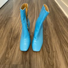 Never Worn, Like New Condition. Blue Ankle-high Boots For Spring, Blue Ankle-high Boots For Fall, Fitted Blue Ankle Boots, Blue Pointed Toe Boots With Reinforced Heel, Blue Ankle Boot Heels For Fall, Light Blue Pointed Toe Boots For Fall, Chic Light Blue Boots With Round Toe, Chic Light Blue Round Toe Boots, Blue Ankle Boots Medium Width