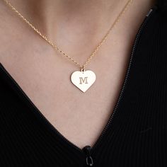 💖 Welcome to our collection of timeless elegance and personalized charm! Our Gold Heart Initial Necklace is a heartfelt tribute to individuality and love. ✨ Each necklace features a delicate 14K solid gold chain adorned with a dainty heart pendant, expertly engraved with your chosen initial. 🎁 Versatile and enduring, this necklace is an ideal gift for any occasion. Celebrate Mother's Day with a thoughtful token of appreciation, surprise a friend on their birthday with a personalized touch, or Initials Charm Necklace With Heart Pendant For Anniversary, Heart Pendant Charm Necklace With Initials For Anniversary, Classic Initial Pendant Charm Necklace For Anniversary, Elegant Initial Necklace With Charms For Mother's Day, Classic Necklaces With Initial Pendant For Anniversary, Classic Necklaces For Anniversary With Initial Pendant, Anniversary Heart Pendant Charm Necklace With Initials, Classic Personalized Initial Necklace For Anniversary, Classic White Gold Charm Necklaces For Anniversary