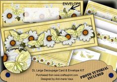 some cards and envelopes with daisies on them, including one for each card