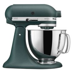 a green mixer with a metal bowl on the top and handle is sitting in front of a white background