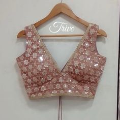 This Made to Order/Made to Measurement/Custom Made Indian Ethnic Blouse. - Fabric - Mirror Work Georgette - Color - Dusty Pink  - Princess Cut - Rich Lined - Sleeveless - Extra margin and extra stitches included in the blouse - It can be customize in any color, design or size  MEAUREMENTS & CUSTOMIZATIONS This blouse can be purchased in your standard sizing and pattern. Please choose your Chest Size (measured in inches) from the drop-down box.. For custom sizing please include the below measurem Sleeveless Designer Blouse Piece For Diwali, Sleeveless Anarkali Blouse Piece For Festivals, Designer Sleeveless Blouse For Diwali, Designer Wear Sleeveless Blouse For Diwali, Bollywood Style Sleeveless Blouse With Mirror Work, Semi-stitched Sleeveless Blouse With Mirror Work, Sleeveless Choli With Pallu For Navratri, Sleeveless Bollywood Blouse Piece For Navratri, Fitted Sleeveless Choli With Dori Work