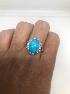 Large genuine aqua blue Larimar Vintage ring Low content silver not sterling. Size 9 My jeweler can re size it for a $10-$20 fee All rings are shipped in a nice gift box. Check out our over a THOUSAND great reviews Engraving is $4 per letter and is not always perfect depending on the piece. It can take a few days if the jeweler is busy. This is payable to Paypal Judithsltd@gmail.com Oval Aquamarine Anniversary Jewelry, Elegant Blue Larimar Turquoise Ring, Formal Turquoise Ring With Accent Stones, Light Blue Oval Jewelry With Accent Stones, Oval Light Blue Jewelry With Accent Stones, Classic Blue Turquoise Ring Stamped 925, Elegant Blue Larimar Rings, Oval Hypoallergenic Jewelry For Anniversary, Hypoallergenic Oval Jewelry For Anniversary