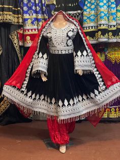 afghan kuchi traditional wedding drees  is made of good quality long lasting fabric. Traditionally such Afghanistan Persian Pashtun new design frocks are used as bridal dress. Most of girls also like and recommend such dresses for wedding, Nikkah and Mehndi night events. The dress measurements are kept average. If you need this frock in exact measurements you need, then please  send us measurements which best fit on your body Traditional Black Ceremonial Dress, Black Dresses With Traditional Patterns For Eid, Eid Dresses With Traditional Black Patterns, Black Dresses With Traditional Patterns For Festive Occasions, Black Festive Dresses With Traditional Patterns, Festive Black Dresses With Traditional Patterns, Festive Black Dress With Traditional Patterns, Black Traditional Drape Dress For Festivals, Black Traditional Drape Dress For Ceremonies