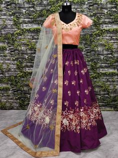 Add glam and style to your traditional aesthetics with the teal Purple color partywear designer legenga.
Featuring a floral embroidered blanglore silk teal blue lehenga paired with blush pink blouse embellished with dori, Zari & Glitter Sequins embroidered neckline.
It comes along with contrast matching soft net dupatta adorned with jari and sequins & Gold Border embroidery work.
It's a perfect outfit for parties, weddings and special occasions. Pair it with matching ethnic accessories & Bridal Wedding Lehenga, Green Lehenga Choli, Wedding Lehenga Choli, Bridal Lengha, Black Lehenga, Bollywood Lehenga, Lengha Choli, Blue Lehenga, Net Lehenga