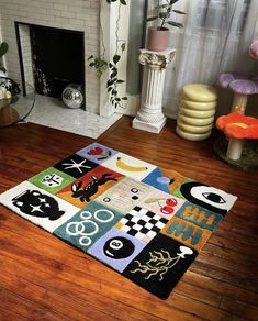 a living room with a fireplace and rugs on the floor