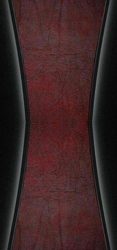 an image of a red and black leather textured surface with lines in the center