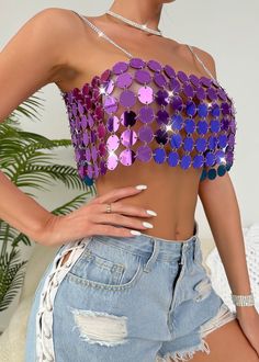 Expertly designed for maximum style and comfort, our Backless Acrylic Camisole Crop Top features a metallic sequin design in a stunning purple shade. The backless design adds a touch of allure, making it the perfect addition to your wardrobe. Elevate any outfit with this must-have piece. Fabric: Non-Stretch Material: Acrylic Fiber Strapless Sequined Crop Top For Summer, Summer Sequined Backless Halter Top, Sequined Backless Halter Top For Summer, Backless Sequined Halter Top For Summer, Purple Summer Crop Top For Parties, Fitted Purple Tank Top For Night Out, Purple Club Tops For Summer, Purple Sleeveless Club Top, Summer Disco Sequin Crop Top