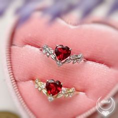 Cue the romance with our stunning Heart’s Desire Red Garnet Ring. This perfect expression of true love features a heart-shaped red garnet center stone along with a curved white topaz leafy band that adds a natural charm. A cherished keepsake that radiates love from every angle. ✦ Available in both 14K yellow gold vermeil (14K yellow gold plated over a sterling silver base) and 10K solid yellow gold. Red Diamond Heart Ring Fine Jewelry, Red Diamond Heart Shaped Ring, Red Diamond Heart-shaped Ring, Red Diamond Heart Cut Ring, Heart-shaped Red Ruby Ring With Diamonds, Red Heart Shaped Ruby Promise Ring, Heart-shaped Ruby Jewelry For Wedding, Red Heart Shaped Rings With Accent Stones, Red Heart Cut Jewelry With Accent Stones