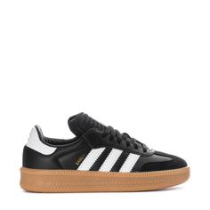 The Samba started as an indoor soccer trainer, but for over 70 years, it's been a staple off the field. The adidas Samba XLG youth shoes bring a fresh twist to the classic with an oversized design and a mix of leather and suede. The timeless colors keep the style effortlessly simple. Pair them with baggy jeans and a graphic tee for a casual day out or with wide-leg pants and your favorite bucket hat for a go-to look.Features: Classic lace closure. Woven "adidas SAMBA" tongue label. Printed "SAMB Adidas Low-top Basketball Shoes With Gum Sole, Adidas Skate Shoes With Gum Sole And Round Toe, Adidas Sports Sneakers With Gum Sole, Adidas Sneakers With Gum Sole For Sports, Adidas Skate Shoes With Gum Sole For Sports, Round Toe Skate Shoes With Gum Sole For Sports, Sports Skate Shoes With Gum Sole And Round Toe, Nike Fits, Soccer Trainer