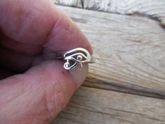 "Eye of Horus ring...3/8\" wide at widest spot, cast in sterling silver 925...ring is a size 8 and can be sized from size 5 to size 8, so when ordering put the size needed in the notes or conversations on the order page....thanks, Bill" Symbolic Sterling Silver Engraved Ring For Gift, Symbolic Sterling Silver Stackable Promise Rings, Nickel-free Silver Engraved Ring Gift, Nickel-free Engraved Silver Ring As Gift, Silver Spiritual Stackable Promise Rings, Adjustable Spiritual Sterling Silver Engraved Ring, Silver Stackable Promise Rings With Spiritual Style, Symbolic Sterling Silver Stackable Rings For Anniversary, Adjustable Nickel Free Sterling Silver Engraved Ring