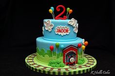 a birthday cake with a thomas the train theme