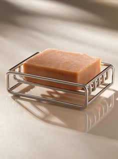 a soap bar sitting on top of a metal holder