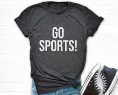 Go Sports Shirt Go Sports Team Shirt Funny Sports T-shirt | Etsy Sporty Text Print T-shirt For Gym, Casual Sports T-shirt With Text Print, Athletic Heather T-shirt With Logo For Sports Season, Sporty T-shirt With Text Print For Sports, Gray Athleisure T-shirt With Letter Print, Sporty Short Sleeve T-shirt For Sports Season, Gray Crew Neck T-shirt For Light Sports, Sporty T-shirt With Graphic Print For Sports Events, Sporty Letter Print T-shirt For Sports