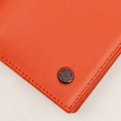 Ted Baker CODY Colour Block Orange Leather Bifold Wallet
Store your cash and cards in one convenient place with this vibrant and ultra-stylish and compact RFID blocking wallet from Ted Baker. Slim enough to slip into your pocket, this wallet is the ultimate accessory to keep you organised on the go!
Made from genuine bovine leather in a vibrant orange hue, this wallet is branded with a gunmetal stud detail on the front. Open the wallet and you’ll find four card slots, a small slip pocket for tickets and receipts, as well as a larger zipped pocket that is perfect for storing notes and coins. The interior pockets are lined with a silky black chequered material, and the Ted Baker logo is subtly embossed inside for an extra touch of sophistication.
The wallet contains an RFID blocker to ensure Baker Logo, I Love You Mum, Porcelain Signs, Rfid Blocking Wallet, Bottle Jewelry, Bee On Flower, Baby Christening, Leather Bifold Wallet, Hanging Hearts