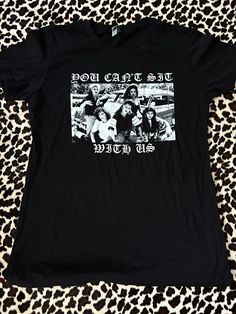 You Can't Sit With Us! Mi Vida Loca/Mean Girls mash up tee! Hand Screened on a women's black 100% cotton t-shirt Pop Culture Crew Neck Tops With Text Print, Pop Culture Text Print Crew Neck Top, Black Y2k Top With Funny Print, Black Slogan Tops For Fan Merchandise, 90s Fan Merchandise T-shirt, Black Funny Print Band Merch Tops, Funny Print Graphic Tee For Fans, Funny Print Graphic Tee For Fan Merchandise, Black Pop Culture T-shirt With Slogan