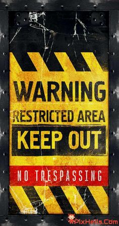 a warning sign is posted on the side of a train car door that says,'warning restricted area keep out no trespassing '