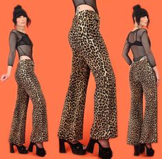 *Such a Rare Find! Vintage 1970's Punk Rock Fuzzy Leopard Flares *Faux Fur + Low Rise + Flares *By Charm of Hollywood SIZE: Fits like a modern 25/26 ( 36 max. hips; fits slim in the thigh) -- Tagged vintage size 9, but Please check measurements provided below to ensure a good fit for you: Waist: 29 inches (sits low) Rise: 11 inches Hips: 36 inches Upper Thigh: 20.5 inches Inseam: 30  inches Color: Shades of Tan + Black Brand: Charm of Hollywood Material: Fuzzy Faux Fur! Condition: Excellent Vintage Condition If you *LoVe* this piece - Check out our other items! Please convo us with any questions. It is the buyer's responsibility to review our store policy page for important information regarding Payment, Shipping, and our Return Policy before purchasing from us. xx~Hellhound Vintage~ 1970s Punk, Leopard Flares, Hip Huggers, 70’s Disco, 70s Disco Party, Cheetah Pants, 70s Punk, Punk Glam, Vintage Clothing Boutique