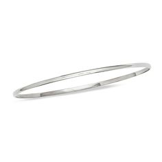 A timeless classic, this sleek bangle elevates any attire. Crafted in cool 14K white gold, this slender 2.0mm-wide design is a great complement to her other bracelets. Polished to a bright shine, this 7.5-inch bracelet slips on and off with ease. Sleek Polished Bangle Jewelry, Sleek Polished Bangle Bracelet, Minimalist Sterling Silver Bangle With Shiny Finish, Classic Polished Sterling Silver Bracelet, Classic Flexible Cuff Bracelet For Formal Occasions, Classic Stackable Sterling Silver Bracelet, Classic Sterling Silver Bangle With Shiny Finish, Minimalist Stackable White Gold Bangle, Classic Flexible Bangle Cuff Bracelet