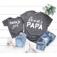 Papa's Girl Shirt, Custom Papa and Me Shirts, Father's Day Shirt, Personalized Matching Papa Shirts, Grandpa and Me Shirts, Fathers Day Gift We wish everyone to smile with our cute, stylish, and trendy graphic T-shirts. We assure you this shirt is the perfect gift whether you buy it for yourself or someone else. Black text is only used for White, Athletic Heather, Baby Blue, Natural, Orange, Yellow, Heather Peach, Pink, Mint, Cancun, Banana Cream, and Desert Pink colored shirts. White text is used for other colored shirts.  Please review all the photos for the appearance of the designs on the shirts. Color and size charts are included in the listing photos. If you have any other design wish that you couldn't find in the shop, do not hesitate to CONTACT us. We are delighted to help you! MG Family Matching Printed Cotton Tops, Matching Graphic Print Tops For Father's Day, Funny Print Cotton Top For Father's Day, Cute Cotton Shirt For Father's Day, Family Matching Gray Tops With Letter Print, Gray Family Matching Tops With Letter Print, Matching Letter Print Cotton Top, Gray Tops With Letter Print For Family Matching, Matching Cotton Tops With Letter Print