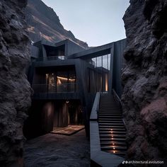 the stairs lead up to this modern house in the mountainside area at night time