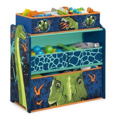 a children's toy storage unit with dinosaurs and giraffes on it