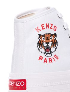 Kenzo high-top sneakers made of cotton canvas and decorated with Kenzo Lucky Tiger logo print on the outer side. Rubber toe, silver-tone metal eyelets. cotton interior with lightly padded insole and rubber sole featuring embossed signature along the sides and logo patch on back.Heel height: 3,5 cmGender: WOMENMaterial: 100% COTTONColor: WHITEMade in: VNProduct ID: FE52SN025F76 01*Import tax/duty will be calculated at checkout (If applicable) Lucky Tiger, Tiger Logo, Hightop Sneakers, High Sneakers, Prada Leather, Sneaker Wedge, Jeans Jumpsuit, Yoga Wear, Chic Design