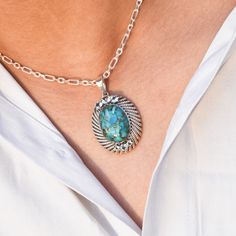 This beautiful piece is handmade in solid sterling silver and features a natural turquoise and blue topaz stone that is nestled in an oval-shaped pendant. It's very lightweight, but with a strong presence of the stone. The simple style makes this piece perfect for any occasion - casual or formal We Assure Your Satisfaction With Our High-Quality Jewelry * Sterling Silver * Natural Gemstone * Nickel free * Made in India With Love And High Standards ※ Please let us know if you have any questions or requests. Thank you for visiting our shop :) Silver Oval Pendant Jewelry With Large Stone, Oval Pendant With Natural Stones For Anniversary, Turquoise Gemstone Oval Pendant Jewelry, Sterling Silver Turquoise Oval Cabochon Jewelry, Silver Turquoise Necklace Stamped 925, Large Oval Turquoise Stone Necklace For Jewelry Making, Oval Pendant Turquoise Necklace For Jewelry Making, Oval Turquoise Pendant Necklace For Jewelry Making, Fine Jewelry Sterling Silver Turquoise Gemstones