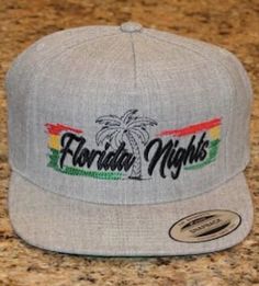 These flat bill hats are fire!! Comfort, Quality, and Style. Premium high-quality embroidery material. Made for all seasons! Each piece is made and produced with comfort in mind. High Quality colors and materials used. This step by step process of production and the new ideas of the collection is built to offer customers excellence in quality and creativity. Florida Nights Apparel flat bill (snap back) hats. Florida Style Clothing, Snap Back Hats, Rastafarian Culture, Flat Bill Hat, Flat Bill Hats, Retro Hats, Florida Style, Black Patch, Purple Hats