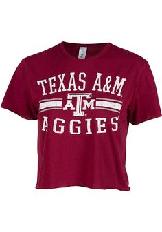 Let everyone know who you root for in this Texas A&M Aggies Maroon Divine Short Sleeve T-Shirt! This Texas A&M Short Sleeve Tee features a distressed center front team name graphic. Crop length, Raw edge details, Ribbed collar, 65% Polyester/35% Cotton, 4 Short Sleeve Cropped T-shirt With Letter Print For College, Cropped Short Sleeve Letter Print T-shirt For College, Cropped Short Sleeve T-shirt With Letter Print For College, Cropped Letter Print T-shirt For College, Collegiate Summer Fan Gear Tops, Short Sleeve T-shirt For Summer Cheerleading, Collegiate Style Summer Fan Gear Tops, Summer Short Sleeve T-shirt For Cheerleading, Summer Fan Gear Graphic Tee Tops