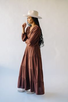 Introducing the Angello Embroidered V-Neck Maxi Dress in Brown! This stunning dress is perfect for any occasion with its elegant embroidery and comfortable v-neck design. Dress up or down for a versatile and stylish look. Details Model is wearing a small self/lining: 100% rayon Fabric Care Guide Here Sizing & Fit Measurements are approximate and taken while laying flat across the front. Not doubled. small: bust = 14"; length = 51" medium: bust = 15"; length = 51" large: bust = 16"; length = 51" Brown V-neck Boho Dress For Fall, Flowy Cotton Boho Dress With V-neck, Elegant V-neck Boho Dress For Fall, Fall Brown V-neck Boho Dress, Fall Brown Boho V-neck Dress, Flowy Rayon Boho Dress With V-neck, Cotton Boho Dress With V-neck, Fall Rayon Boho Dress With V-neck, Fall V-neck Boho Dress In Rayon