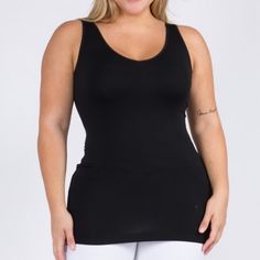 This Will Become Your Fave, Go To Top. I Live In Mine! This Is The Long Version Of This Cami. Available In Shorter Version In My Closet. This Is Reversible. One Side Is A U-Neck. Flip It Around And It Becomes A V-Neck! Two In One Style. One Plus Size. Very Stretchy. This Seamless Tank Makes Styling Any Outfit A Breeze! Featuring A V-Neckline And Fitted Silhouette In A Buttery, Soft Fabric That's Very Comfortable For Wearing All Day. Wide Shoulder Straps V-Neckline Back Scoop Neck Fitted Silhouet Black Seamless Tank Top For Yoga, Black Camisole With Built-in Bra For Layering, Snug Fit Sleeveless Tops With Built-in Bra, Black Tank Top For Yoga With Bust Support, Black Tank Top With Bust Support For Yoga, Black Tank Top With Medium Bust Support For Yoga, Black Seamless Construction Shapewear Top, Black Stretch Camisole With Built-in Bra, Black Tank Top With Medium Support And Seamless Design