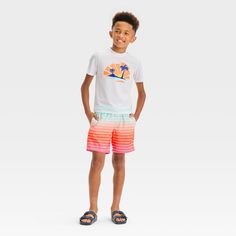 Add some seaside fun to their swim closet with the Short-Sleeve Tree Printed and Striped Rash Guard Top and Swim Shorts Set from Cat & Jack™. This two-piece swimwear set includes a short-sleeve rash guard top with a seaside print at the front and matching striped shorts for a cool look they'll love. The swim shorts are designed with built-in-brief and full waistband elastic to help keep them comfortable. Plus, tailored with UPF 50+ fabric, the pieces offer sun protection. Cat & Jack™: Kids’ clot Seaside Print, Two Piece Swimwear, Swimwear Sets, Tree Print, Pair Of Pants, Rash Guard, Swim Top, Shorts Set, Striped Shorts