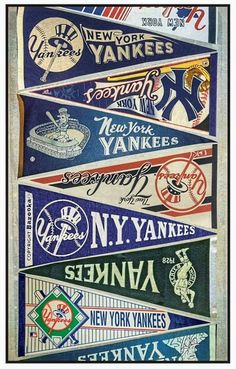 the new york yankees baseball pennants are hanging up